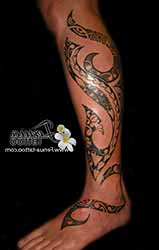 tatouage-polynesien-jambe-homme.jpg
